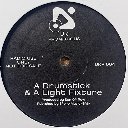 A Drumstick & A Light Fixture